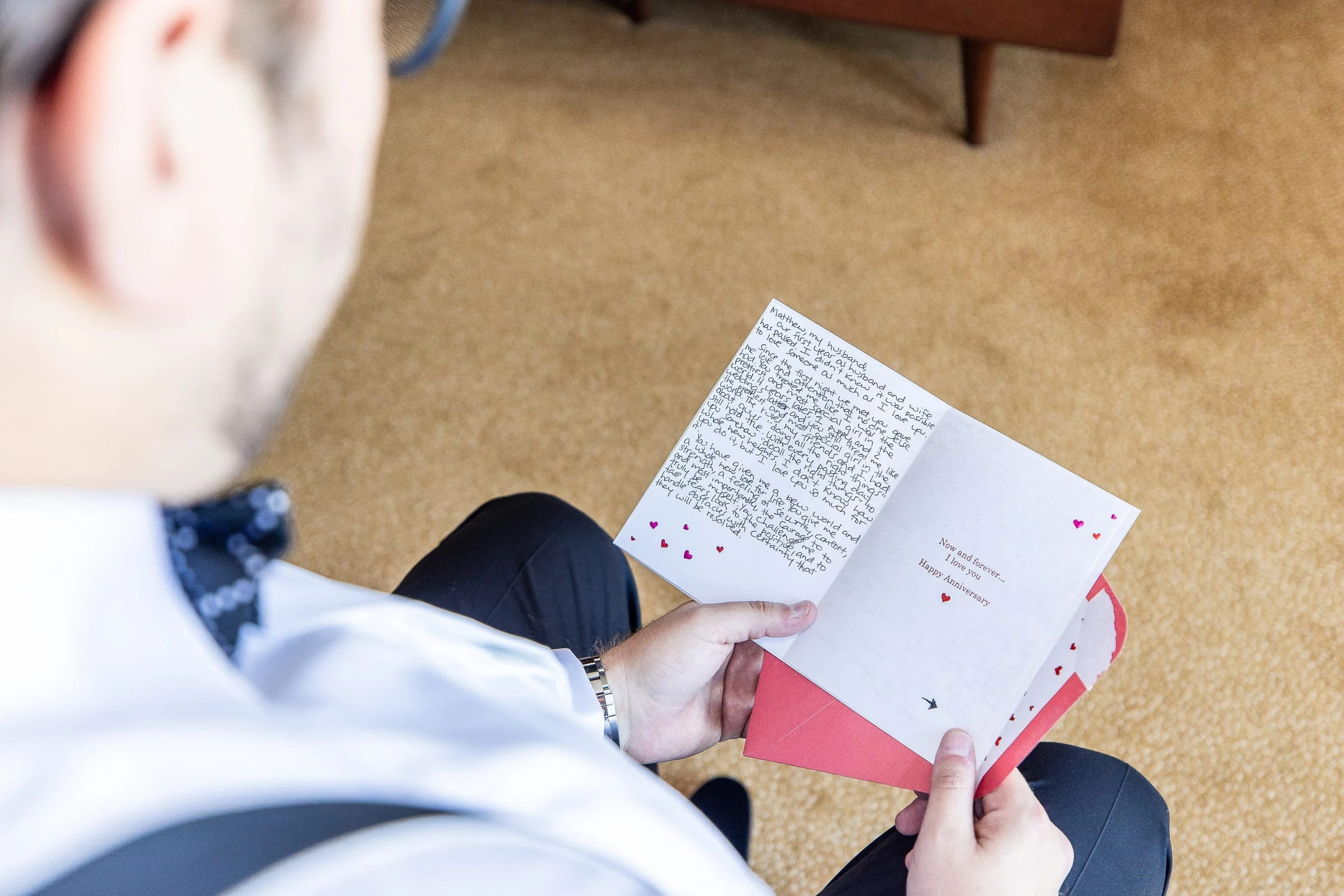 The groom reading a letter before the ceremony — Casa Cipriani, New York