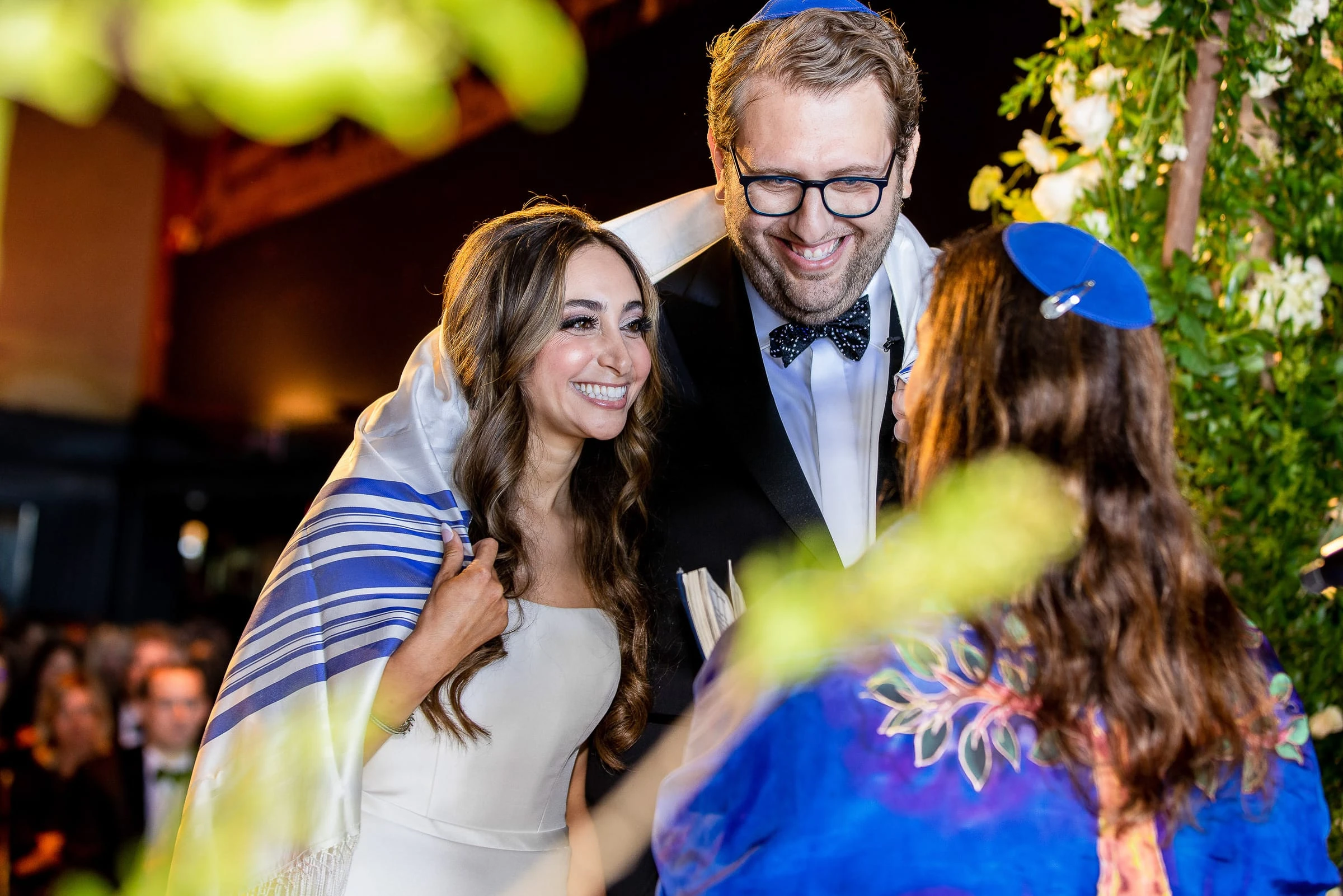 The couple wrapped together in the tallit — Casa Cipriani, New York