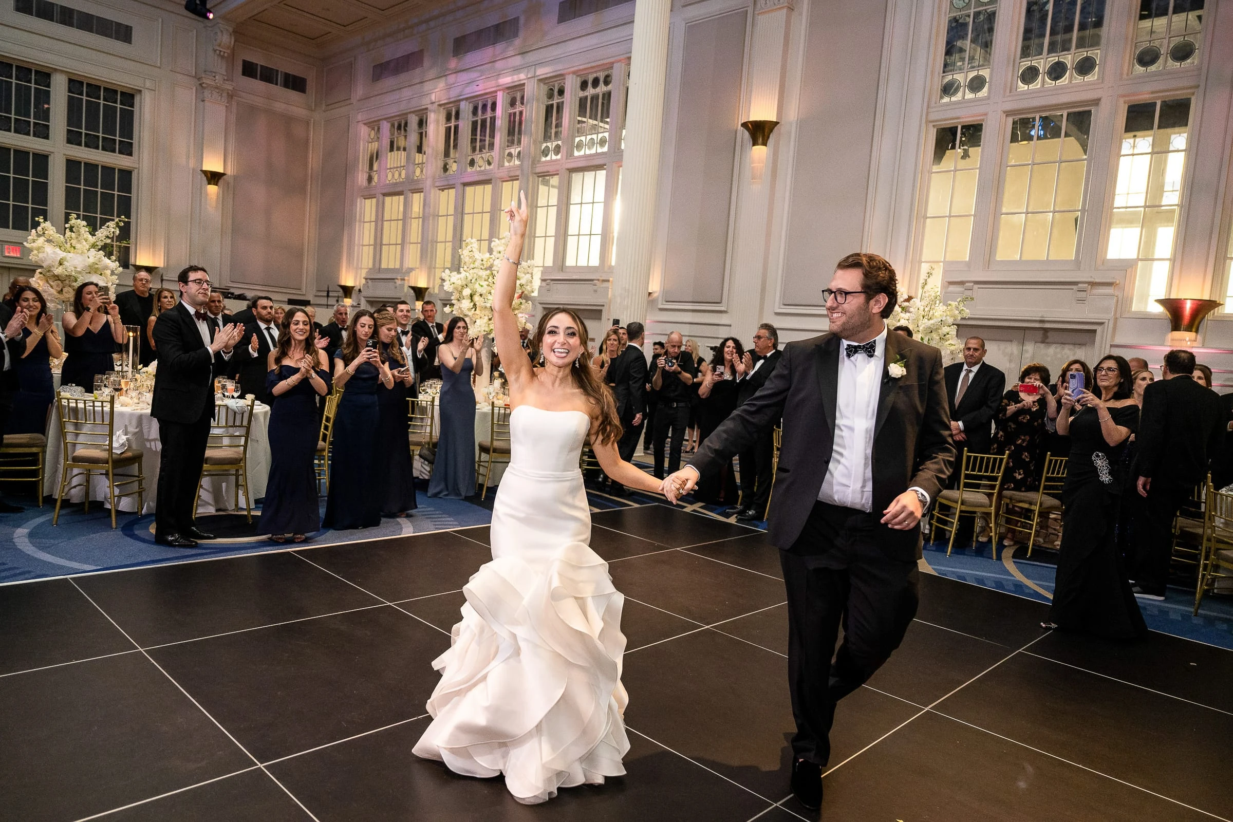 The first dance as the guests clap around them — Casa Cipriani, New York