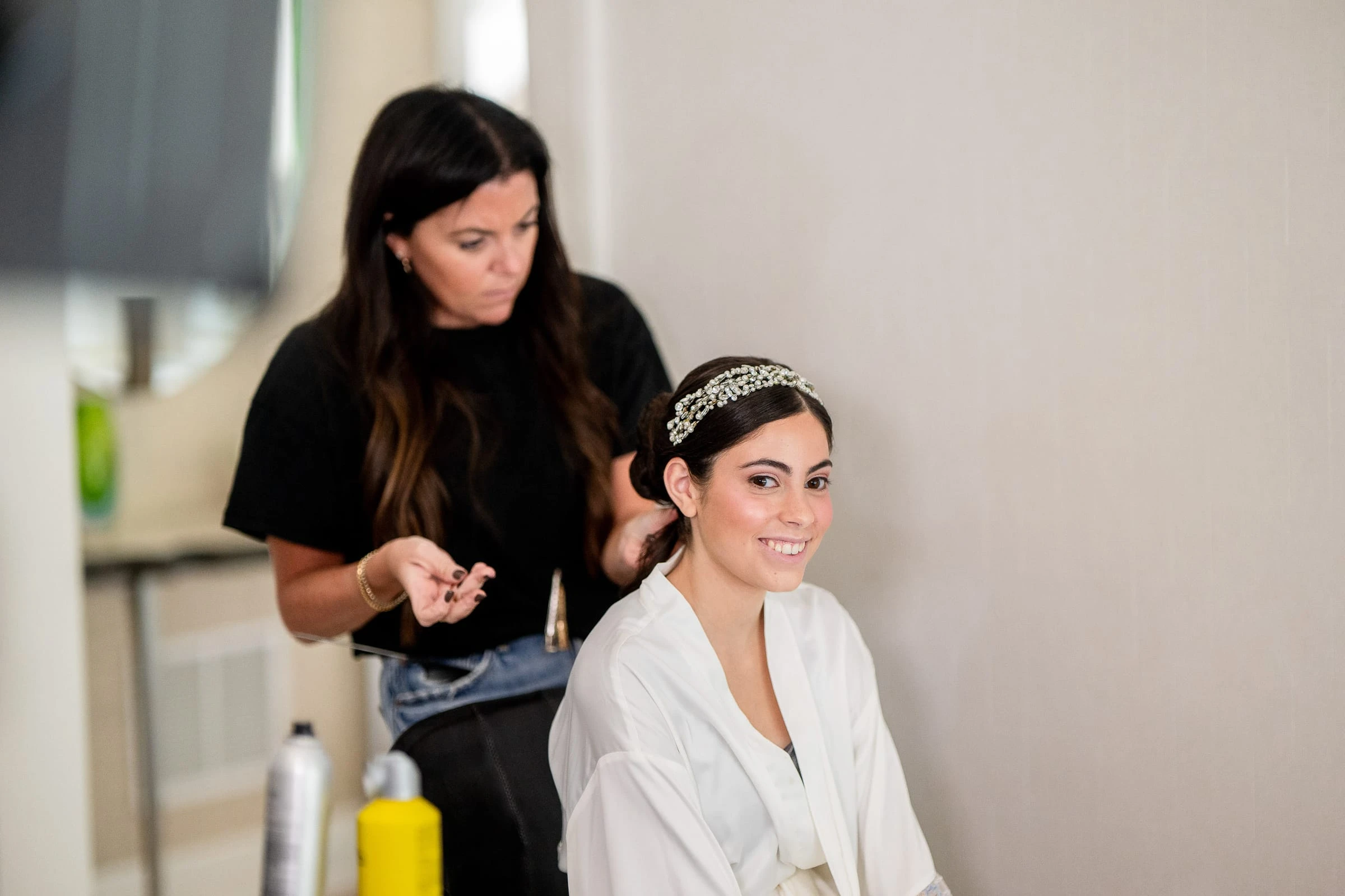 The bride having her hair finished before the ceremony — Shadowbrook at Shrewsbury, Shrewsbury