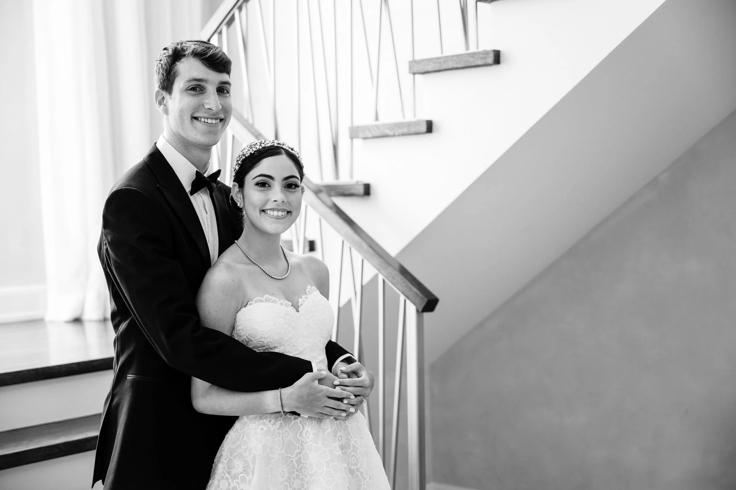 The couple together on the staircase after the first look — Shadowbrook at Shrewsbury, Shrewsbury