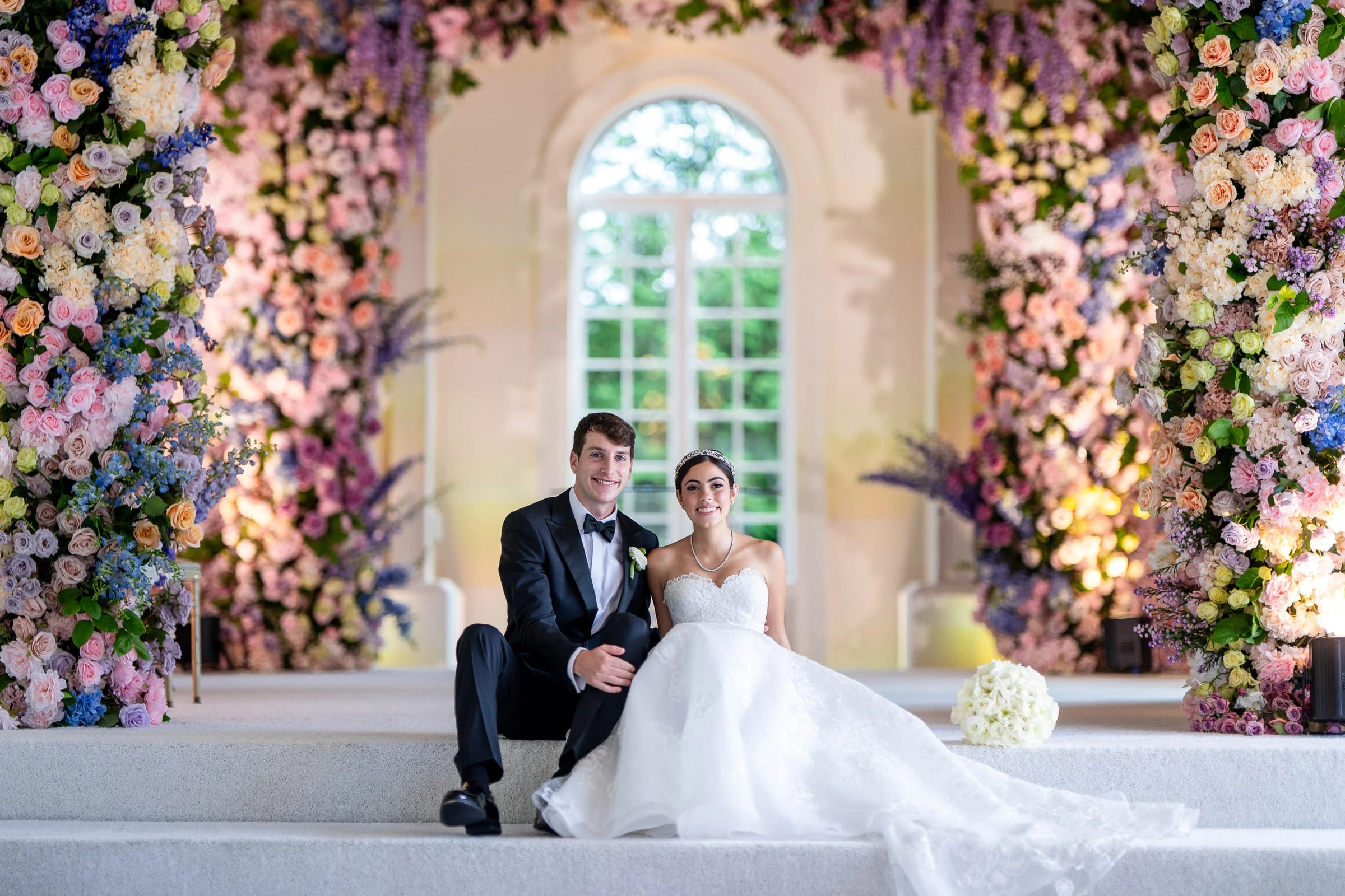 The couple seated on the step among the flowers — Shadowbrook at Shrewsbury, Shrewsbury
