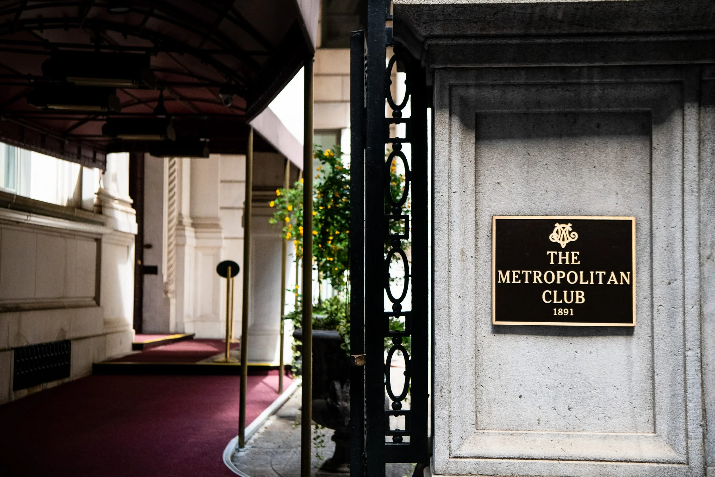 The Metropolitan Club plaque beside the entrance — Metropolitan Club, New York