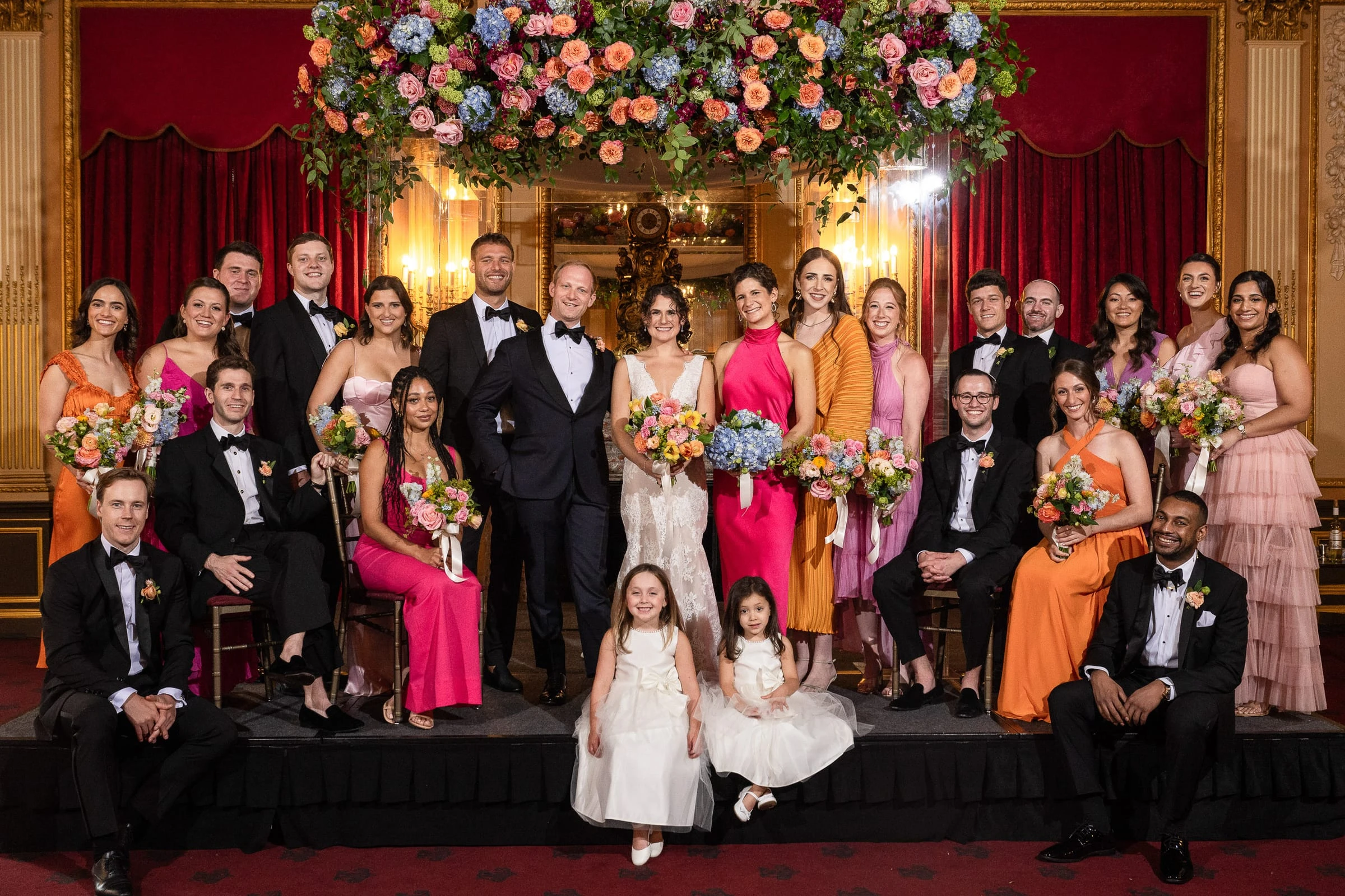 The full wedding party on the platform beneath the chuppah — Metropolitan Club, New York