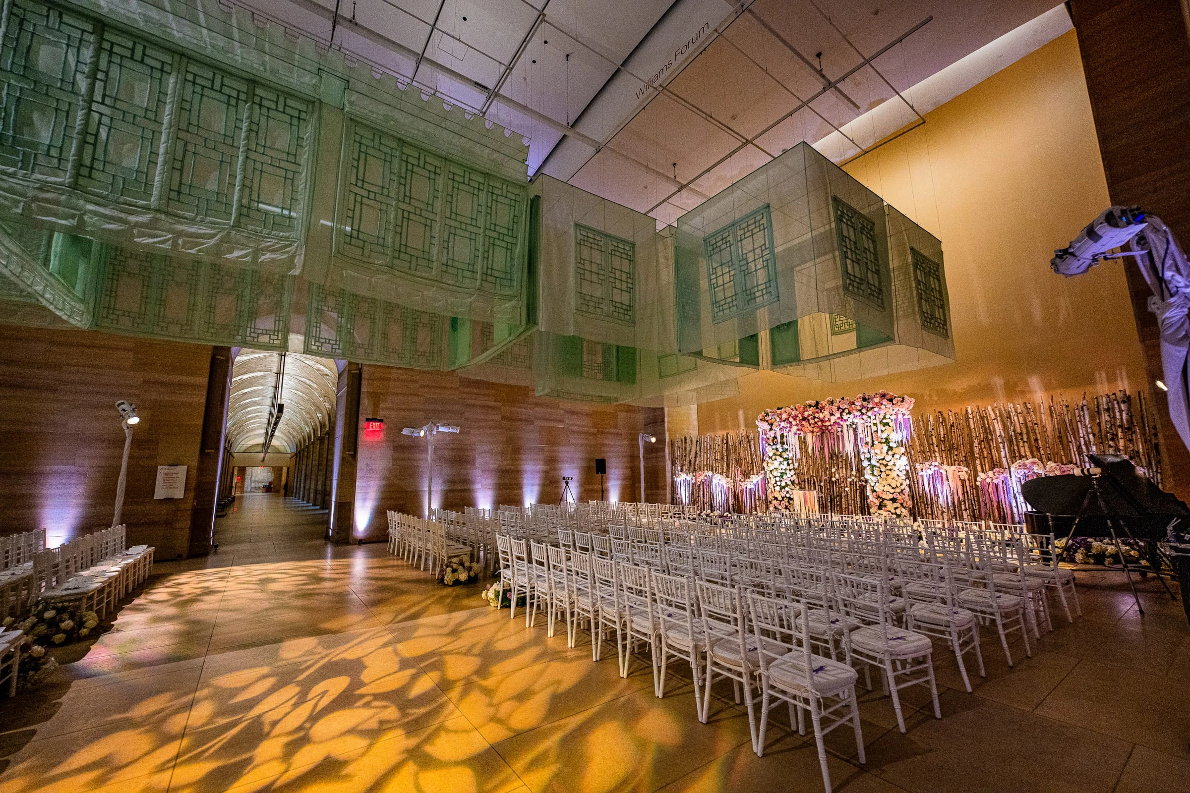 The ceremony room set with chairs beneath the hanging glass installation — Philadelphia Museum of Art, Philadelphia
