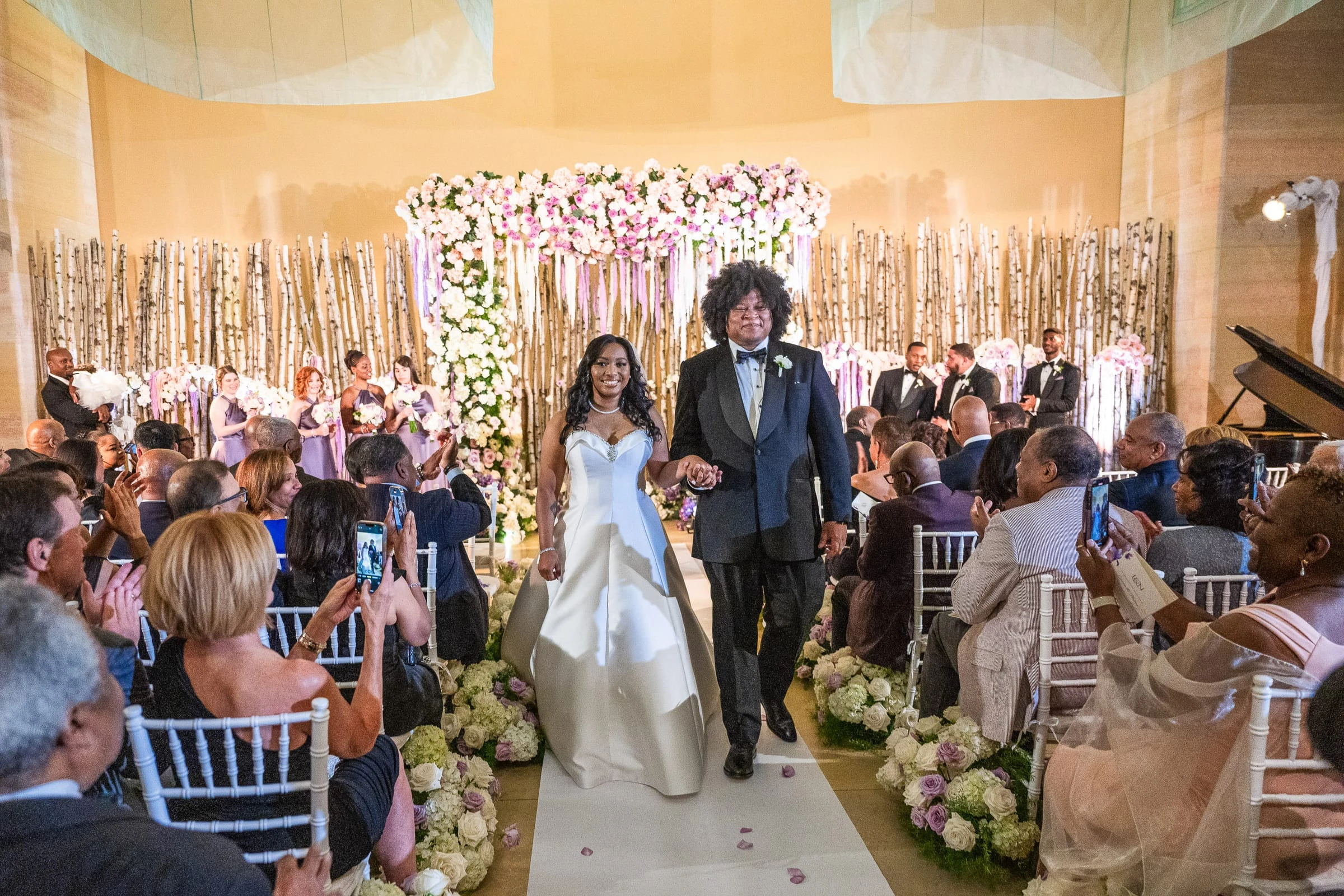 The recessional down the aisle as guests raise their phones — Philadelphia Museum of Art, Philadelphia
