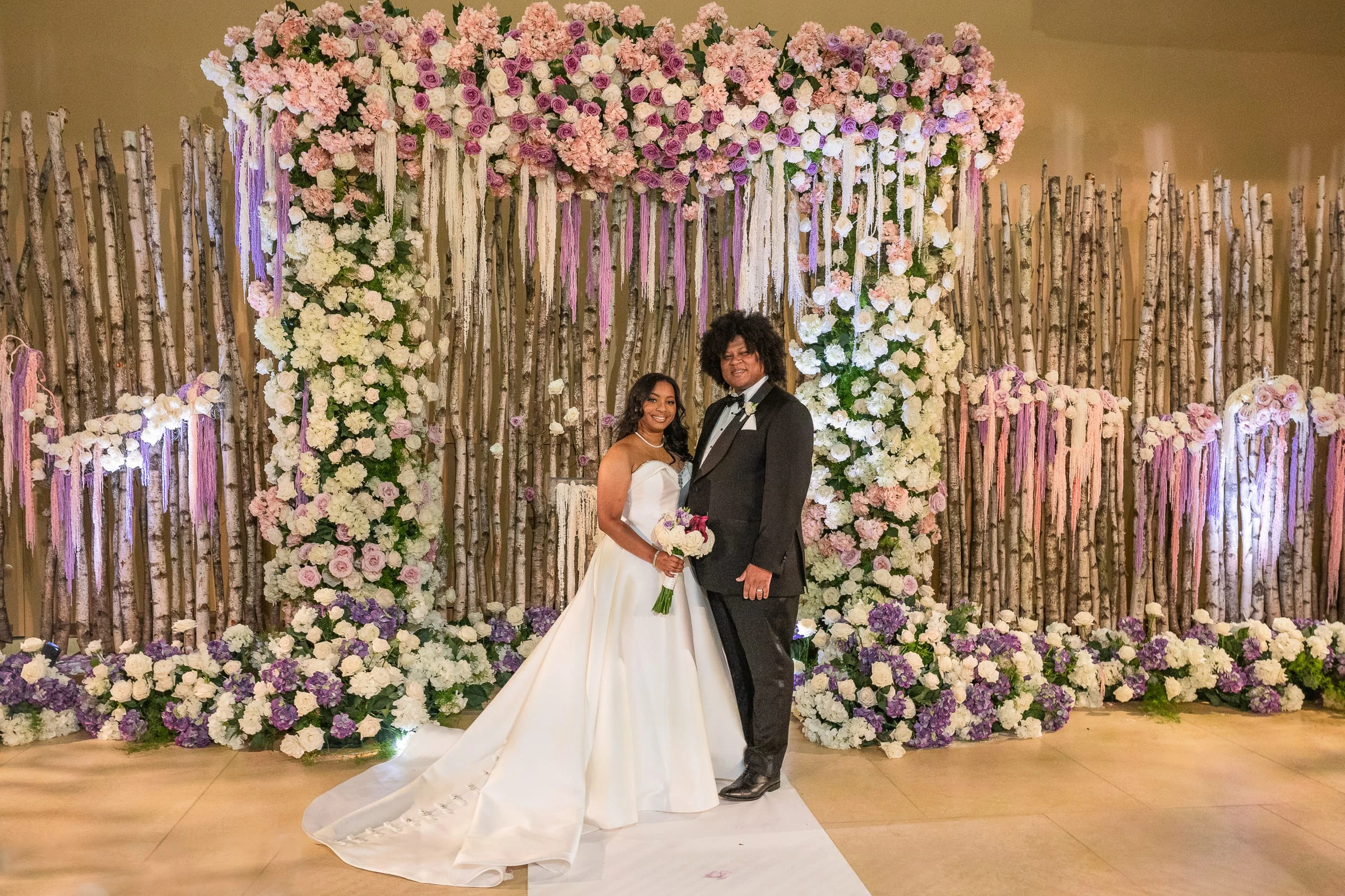 The couple in front of the flowered chuppah — Philadelphia Museum of Art, Philadelphia