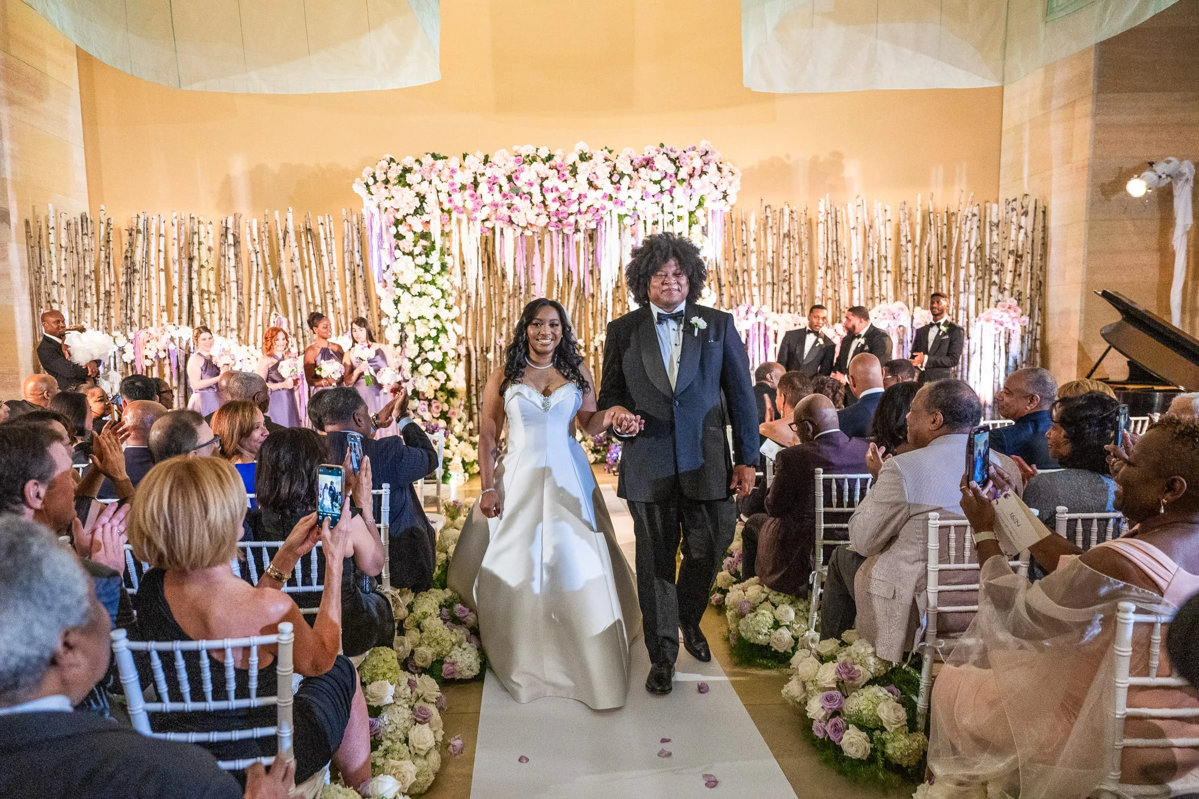 The recessional down the aisle as guests raise their phones — Philadelphia Museum of Art, Philadelphia